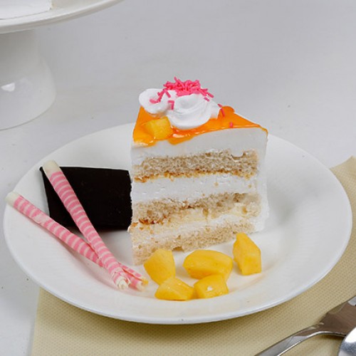 Tempting Summer Mango Fruit Cake Delivery in Ghaziabad