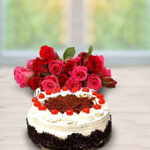 Online Delicious Black Forest Cake with Red Roses Delivery in Ghaziabad ...