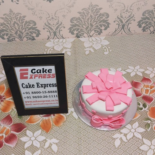 Pink Bow Truffle Fondant Cake Delivery in Ghaziabad