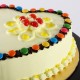 Heart Shaped Butterscotch Gems Cake Delivery in Ghaziabad