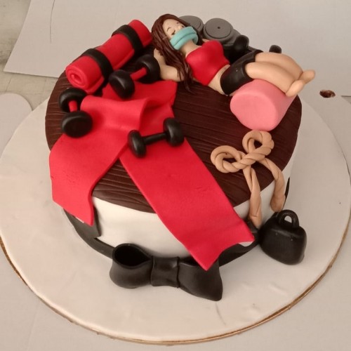 Gymaholic Girl Fondant Cake Delivery in Ghaziabad